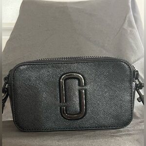 Marc Jacob’s, small double zipper compartment crossbody bag.